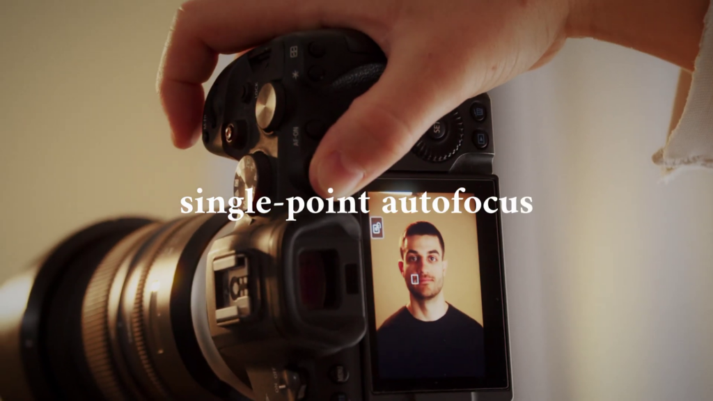 Using single-point autofocus to focus on a subject's eyes in a portrait.